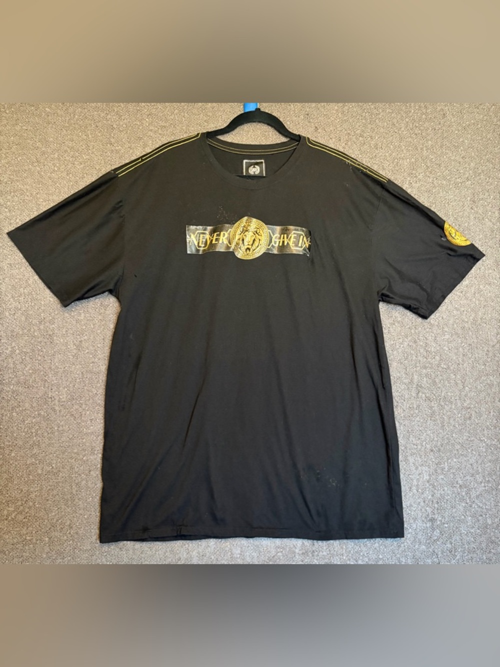 Black Short Sleeve Tee with Gold Crest Graphic